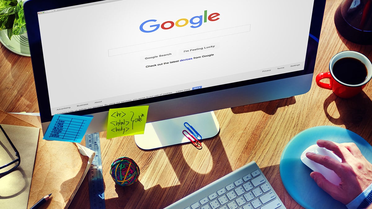 Man Using Computer Browsing Google Website