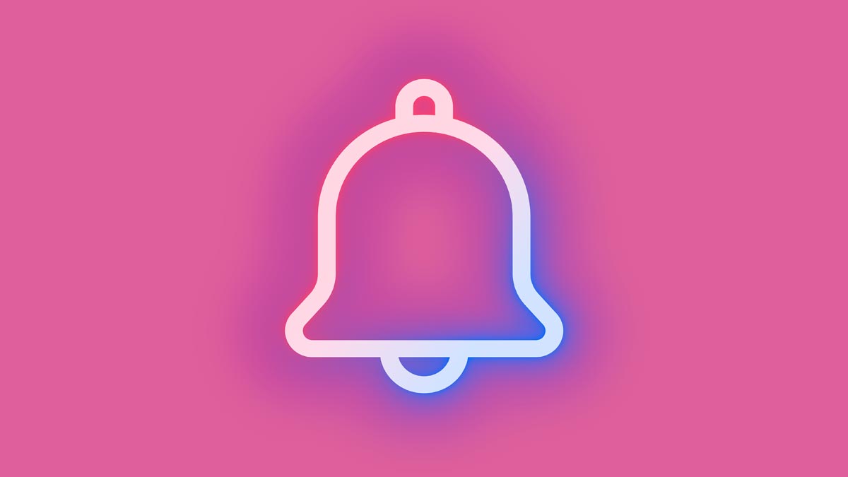 Una campana en neón sobre un fondo rosa