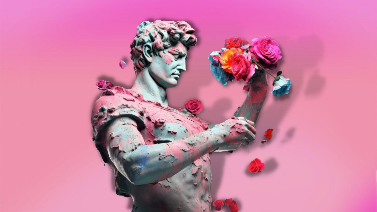 estatua con flores sobre fondo rosa